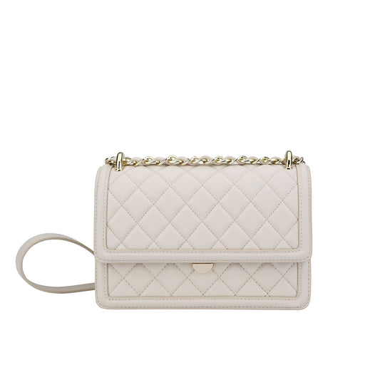 A cream-colored quilted leather shoulder bag with a gold chain strap and a small gold turn-lock clasp, shown against a plain white background.