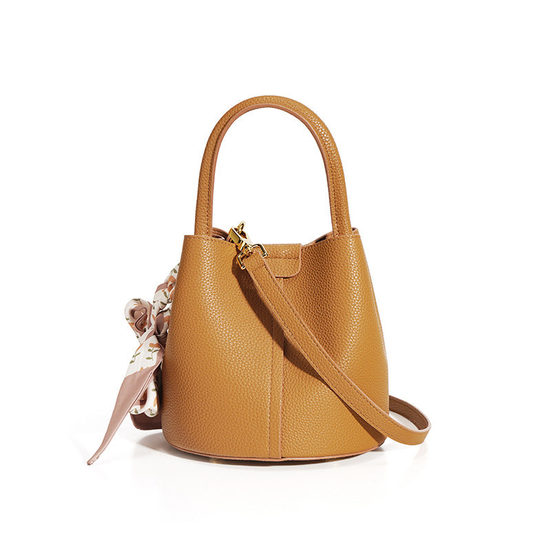brown_handbag_J.Crew_niras_essentials_in_USA